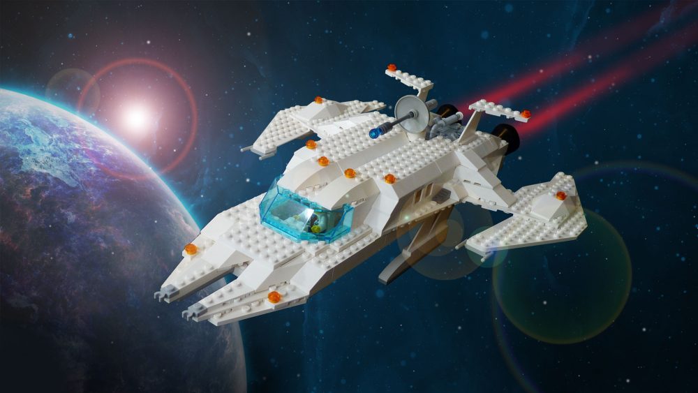 LEGO ruimteschip in de ruimte met op de achtergrond een planeet en een zon